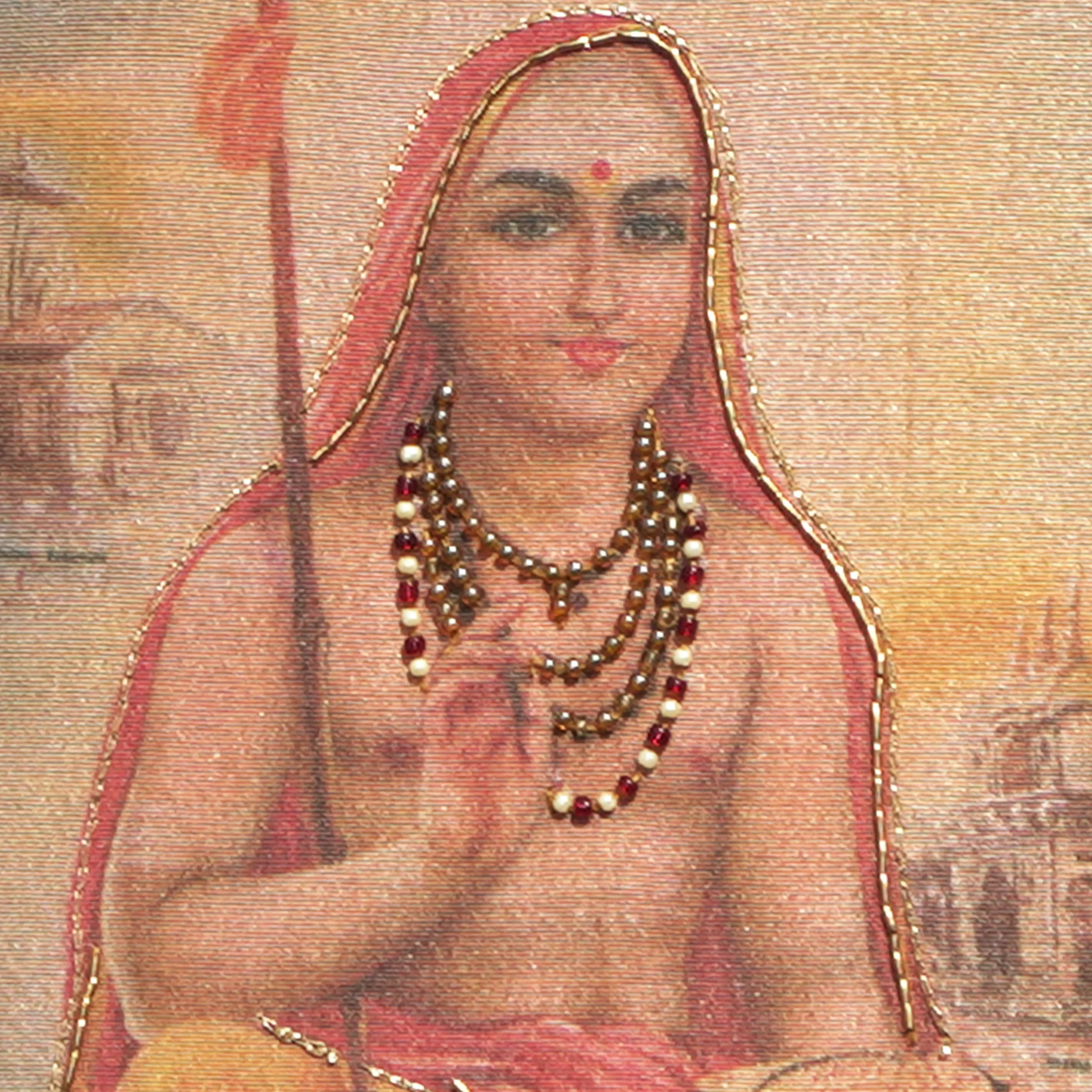 Close-up of Aadhi Sankarar face and crown detail with handcrafted Ari and Zardoshi embroidery on raw silk