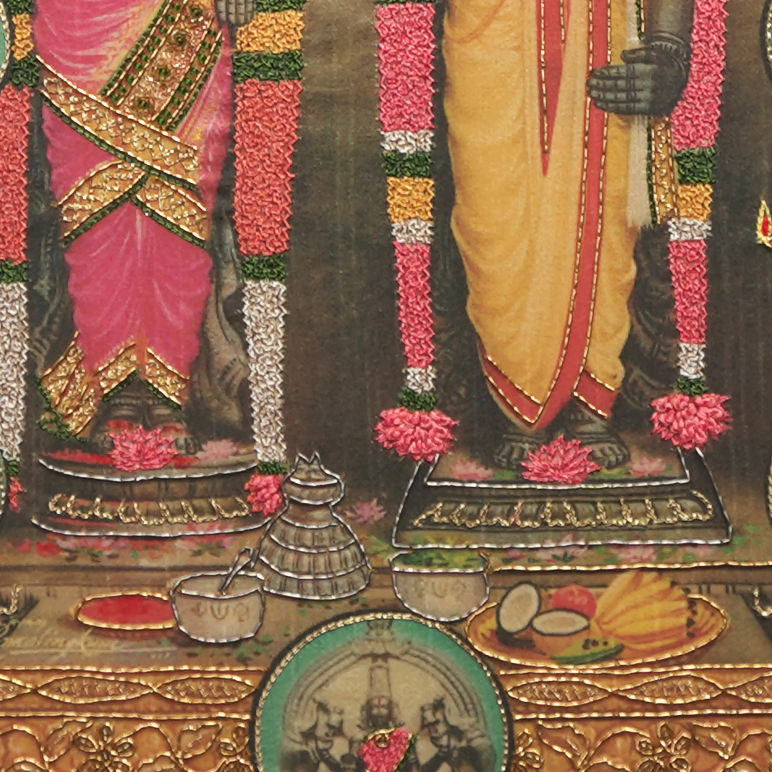 Close-up of Ashtalakshmi lower body embroidery showing intricate Zardoshi threadwork on raw silk