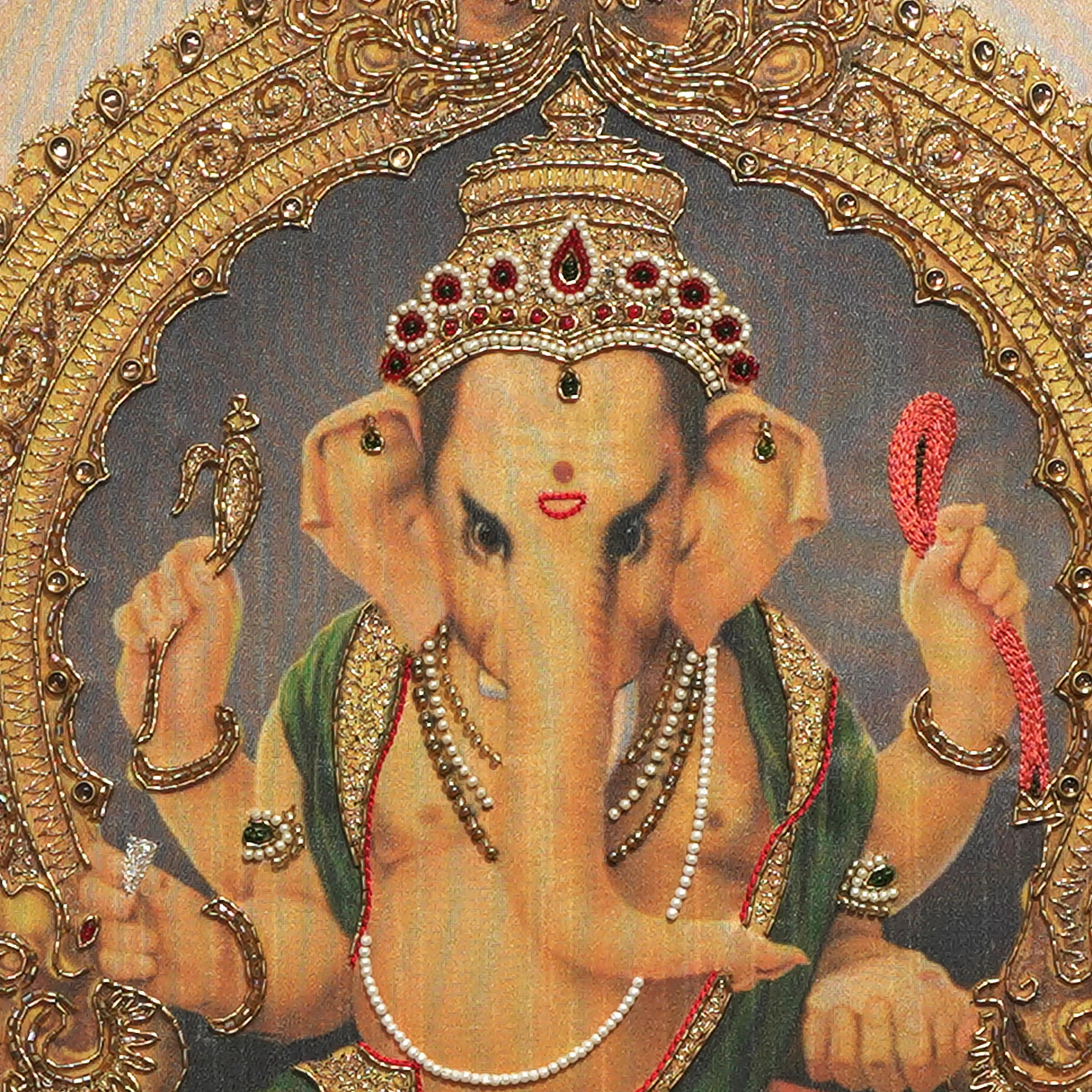 Close-up of Lord Ganapathy face and crown detail with handcrafted Ari and Zardoshi embroidery on raw silk