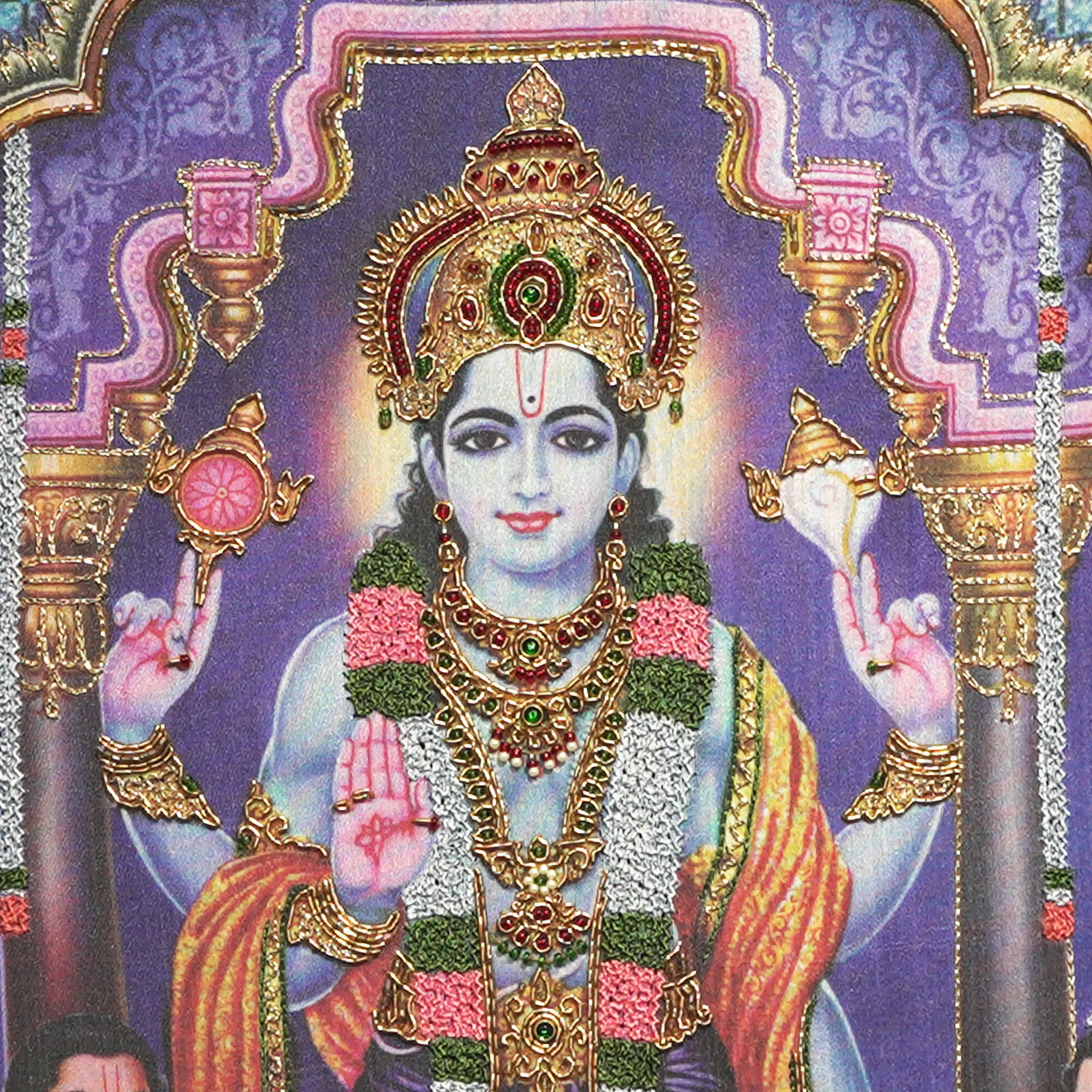Close-up of Lord Sathyanarayana face and crown detail with handcrafted Ari and Zardoshi embroidery on raw silk