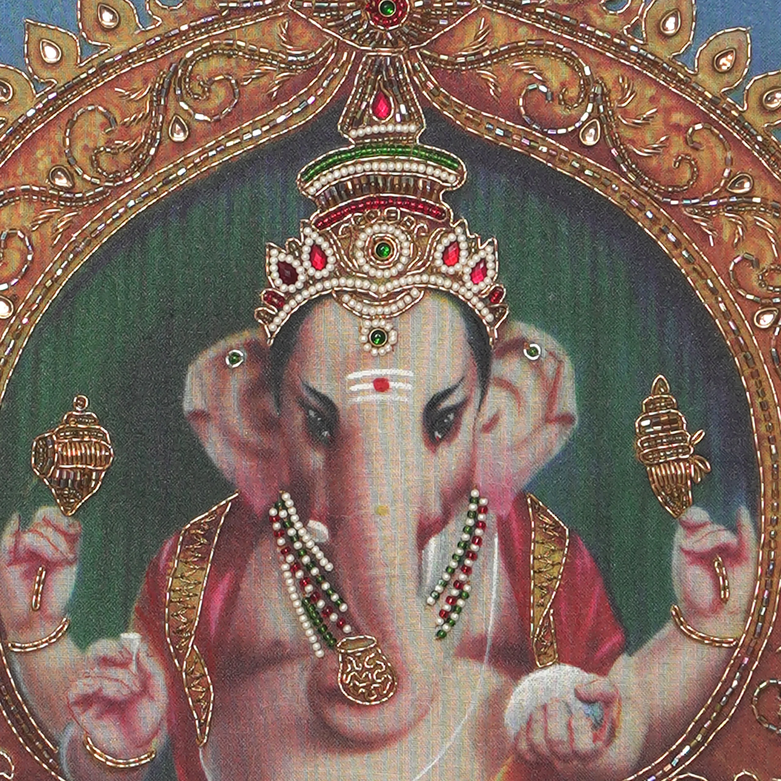 Close-up of Lord Vinayagar face and crown detail with handcrafted Ari and Zardoshi embroidery on raw silk