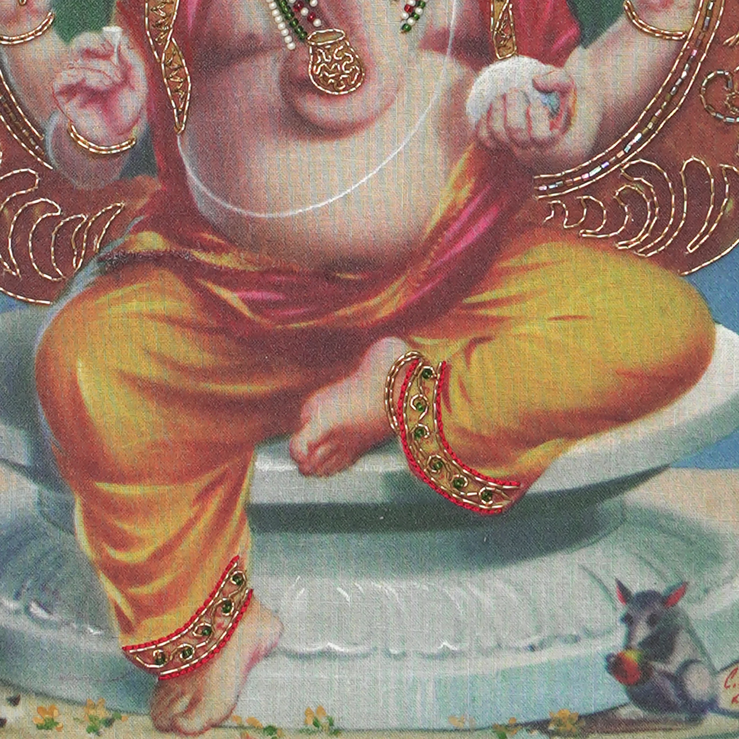 Close-up of Lord Vinayagar lower body embroidery showing intricate Zardoshi threadwork on raw silk