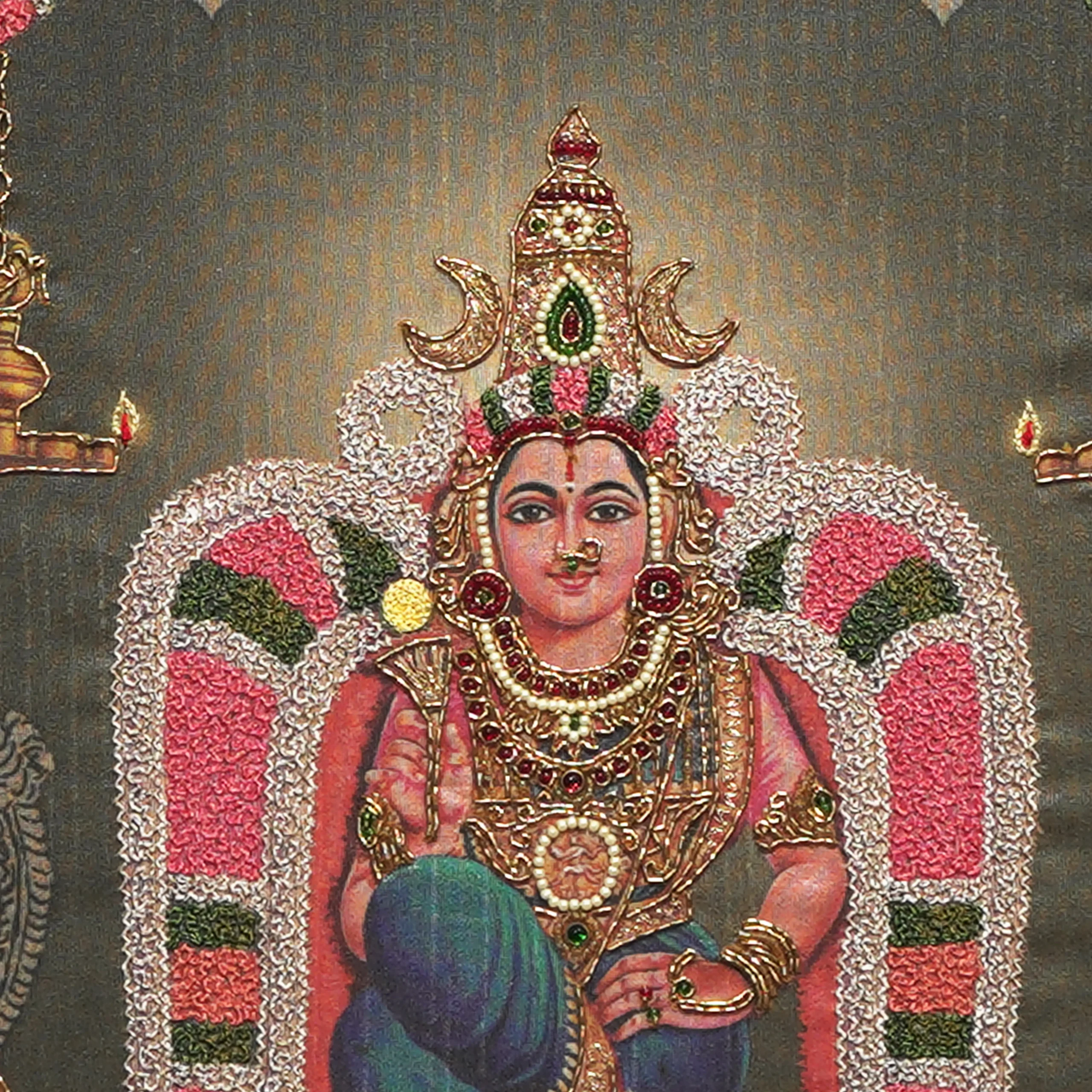 Close-up of Sri Kamalambigai face and crown detail with handcrafted Ari and Zardoshi embroidery on raw silk