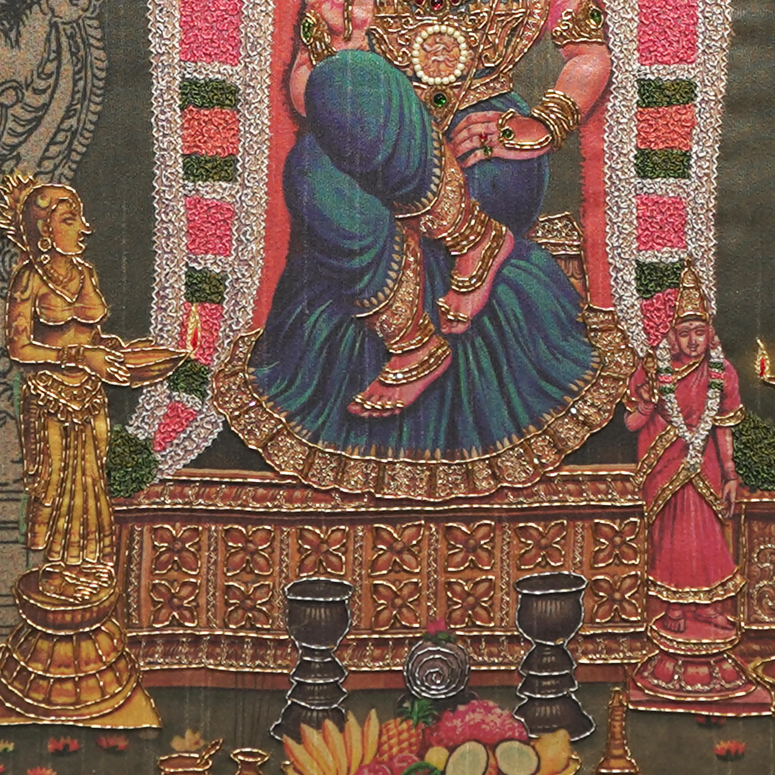 Close-up of Sri Kamalambigai lower body embroidery showing intricate Zardoshi threadwork on raw silk