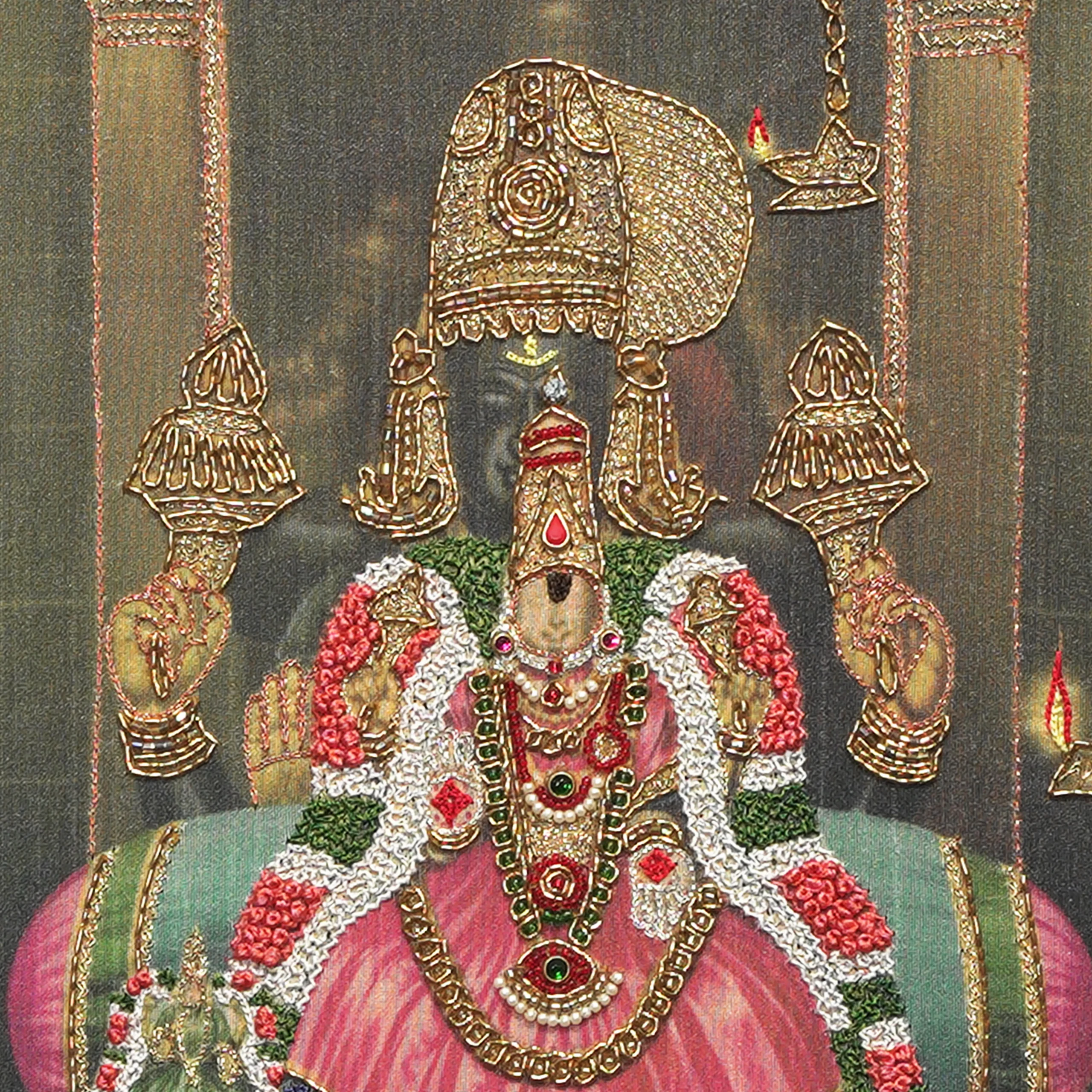 Close-up of Sri Renga Natchiyar face and crown detail with handcrafted Ari and Zardoshi embroidery on raw silk