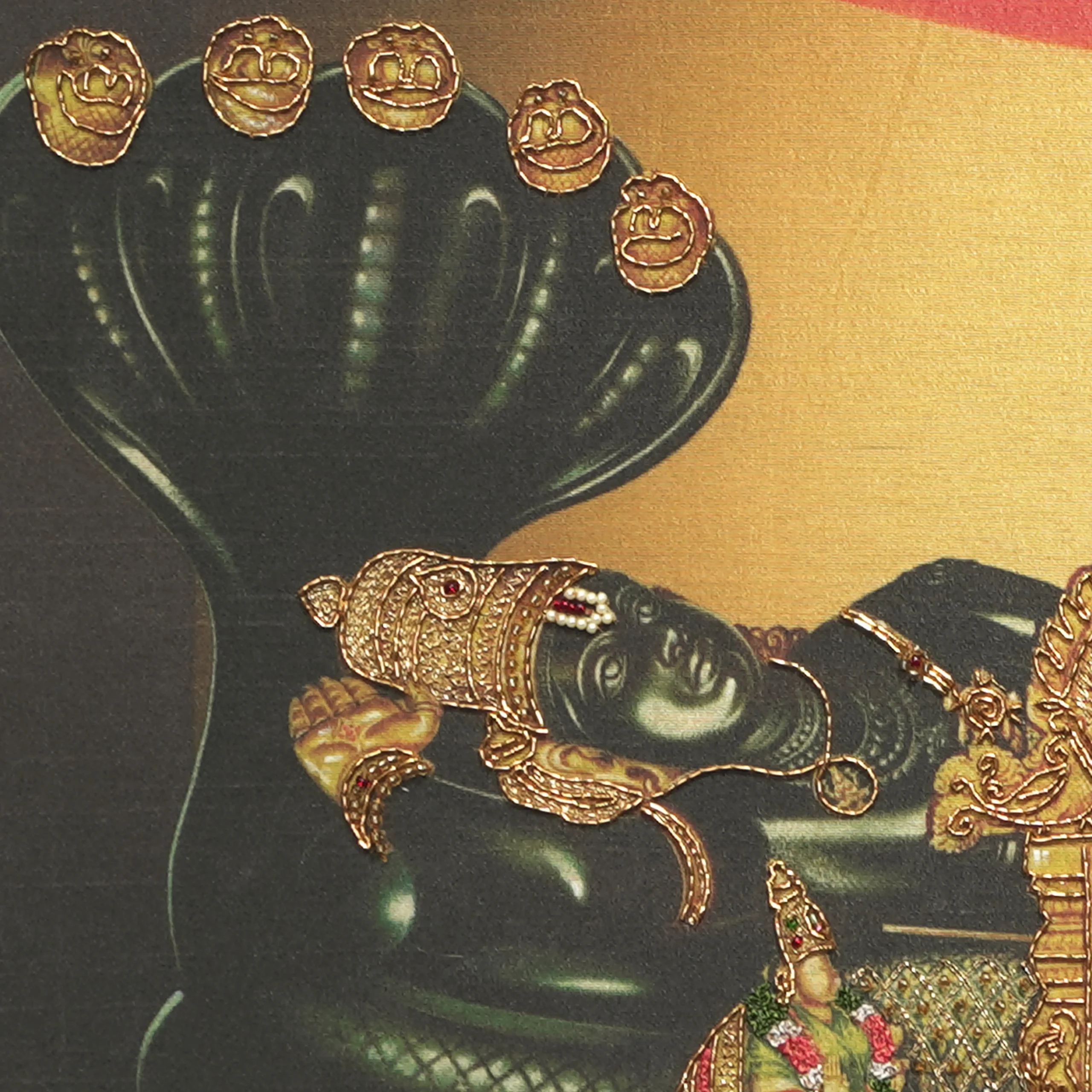 Close-up of Sri Renganathar face and crown detail with handcrafted Ari and Zardoshi embroidery on raw silk