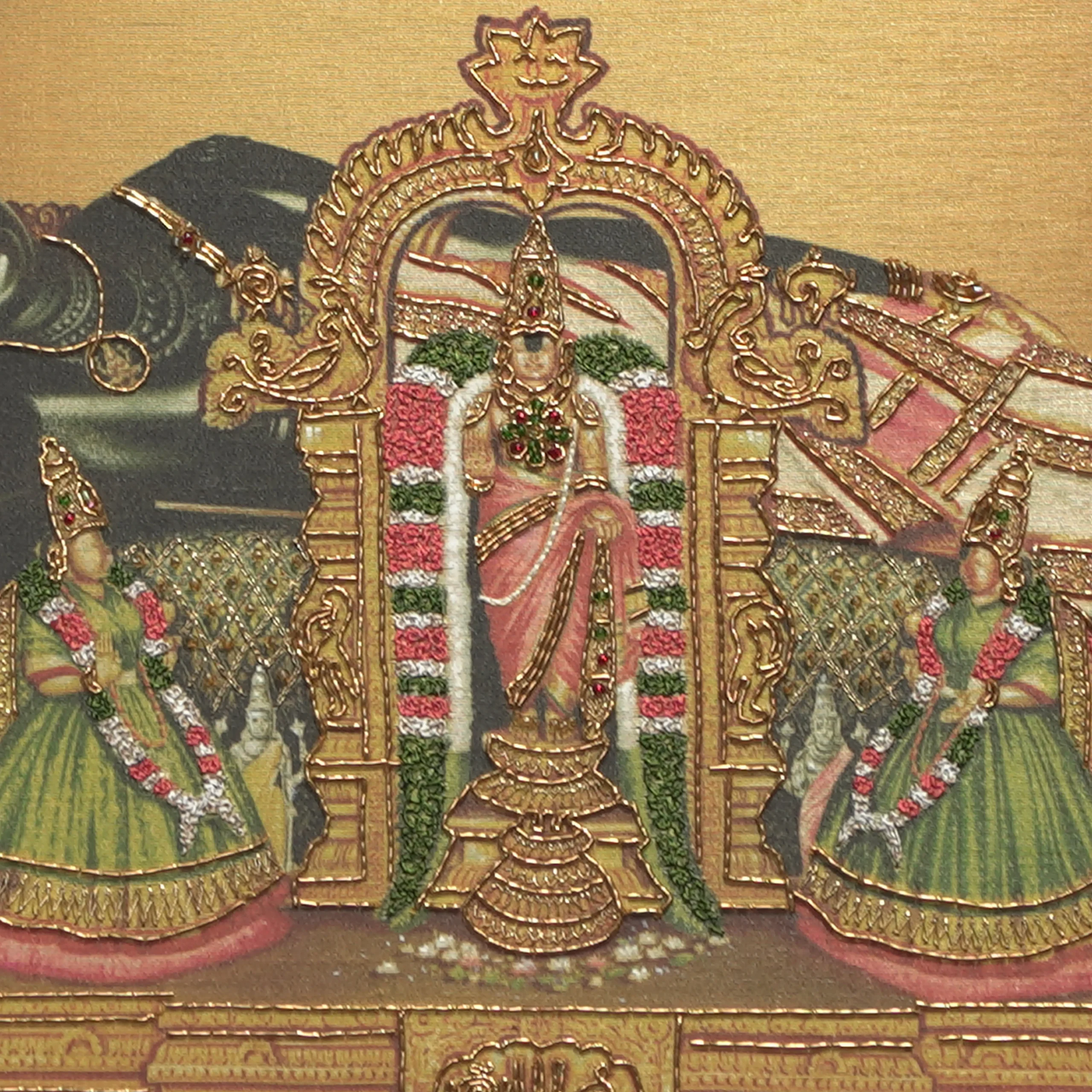 Close-up of Sri Renganathar lower body embroidery showing intricate Zardoshi threadwork on raw silk